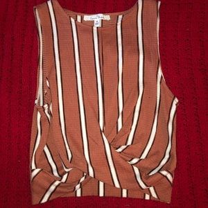 Burnt orange top with black and white strips 🖤